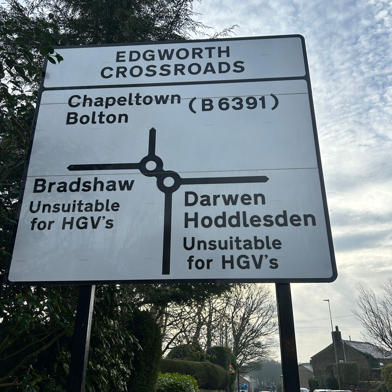 sign-cleaning-bolton8sq a road sign in edgworth bolton after it has been cleaned